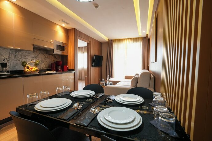 Imagen de la habitación del Hotel First Suites Hôtel. Foto 20