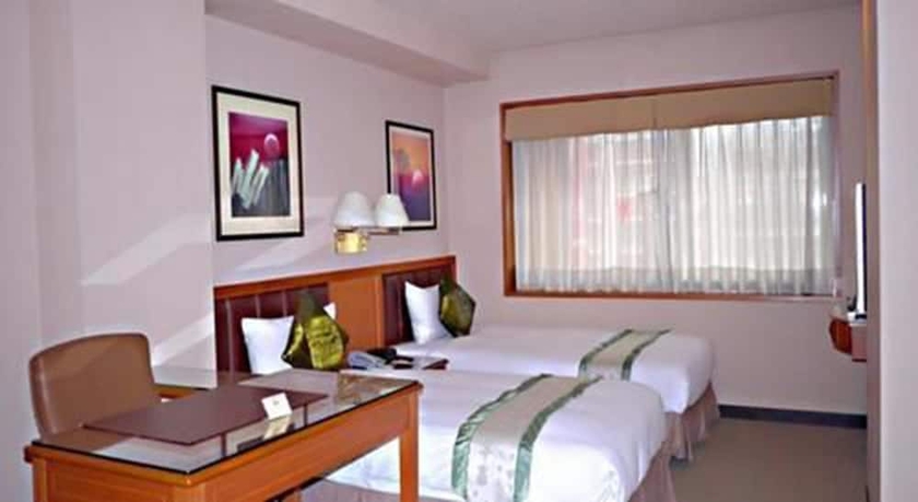 Imagen de la habitación del Hotel First, Taipei. Foto 6