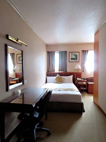 Imagen de la habitación del Hotel First, Taipei. Foto 9