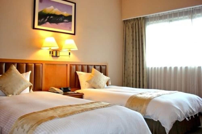 Imagen de la habitación del Hotel First, Taipei. Foto 10