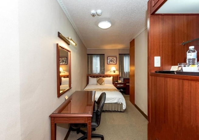 Imagen de la habitación del Hotel First, Taipei. Foto 14