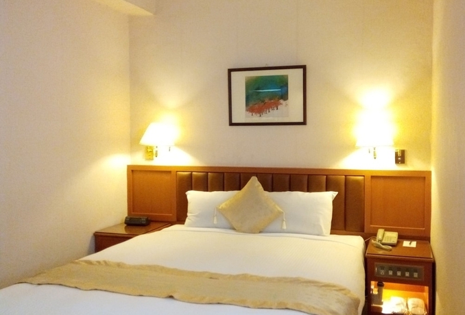 Imagen de la habitación del Hotel First, Taipei. Foto 15