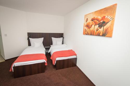 Imagen de la habitación del Hotel First, Tczew. Foto 7