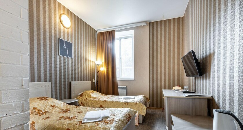 Imagen de la habitación del Hotel First Train. Foto 12