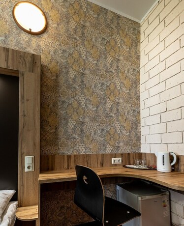 Imagen de la habitación del Hotel First Train. Foto 14