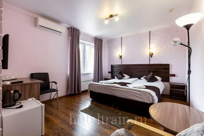 Imagen de la habitación del Hotel First Train. Foto 17