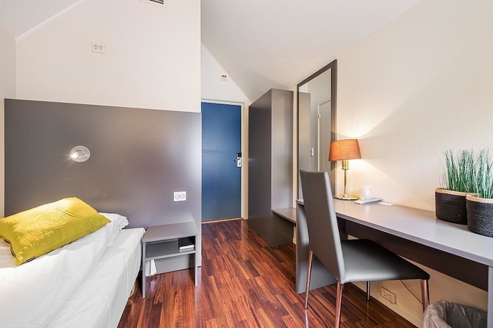 Imagen de la habitación del Hotel First Viking. Foto 12