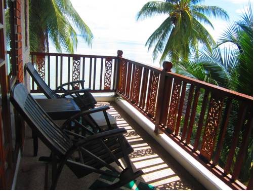 Imagen de la habitación del Hotel First Villa Beach Resort. Foto 10