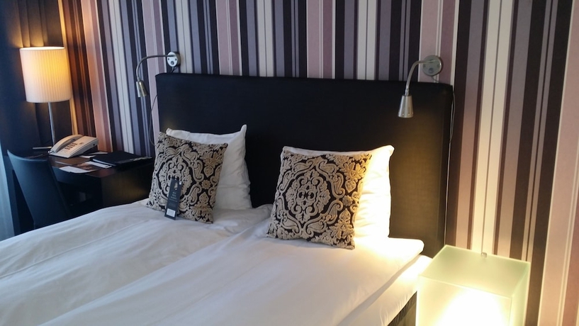 Imagen de la habitación del Hotel First Witt. Foto 5