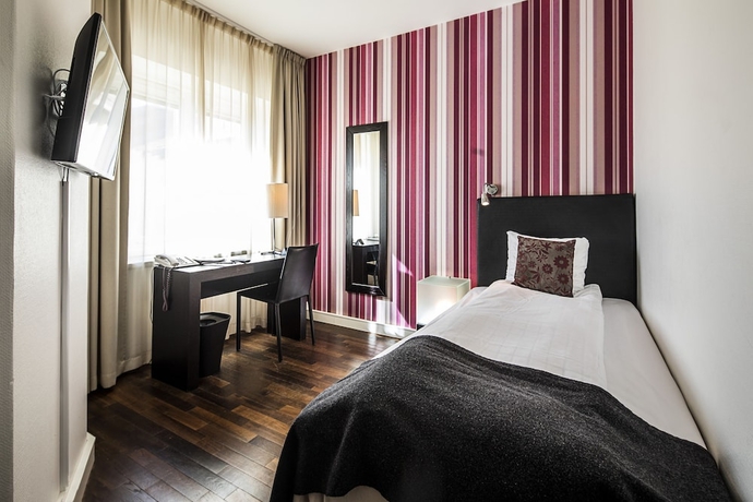 Imagen de la habitación del Hotel First Witt. Foto 10