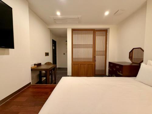 Imagen de la habitación del Hotel Firststay Hongdae. Foto 19