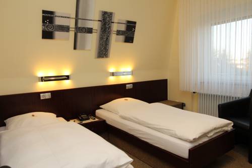 Imagen de la habitación del Hotel Firzlaffs Neum&uuml;nster. Foto 10