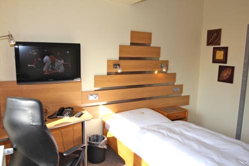 Imagen de la habitación del Hotel Firzlaffs Neum&uuml;nster. Foto 12