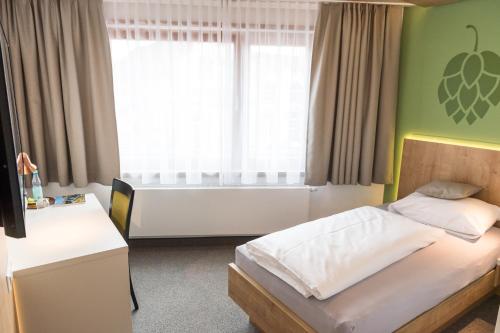 Imagen de la habitación del Hotel Fischer\'s Brauhaus. Foto 5