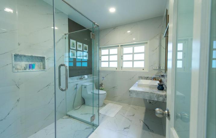 Imagen de la habitación del Hotel Fisherman Way Beach Villa. Foto 7