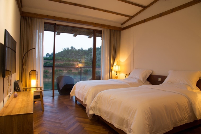 Imagen de la habitación del Hotel Fishman Homestay. Foto 19