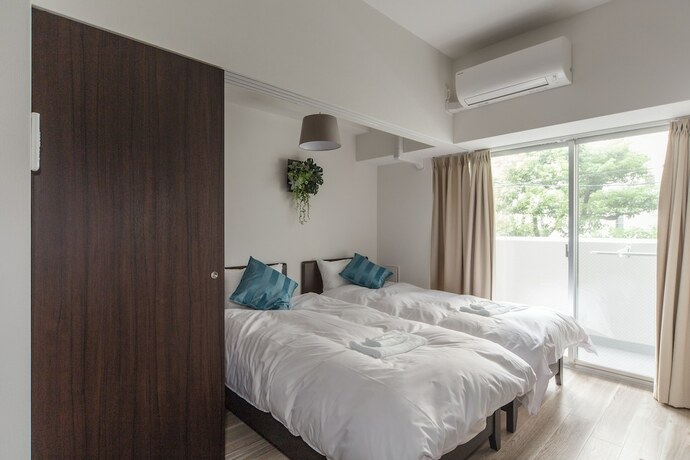 Imagen de la habitación del Hotel Five Court Umeda. Foto 17