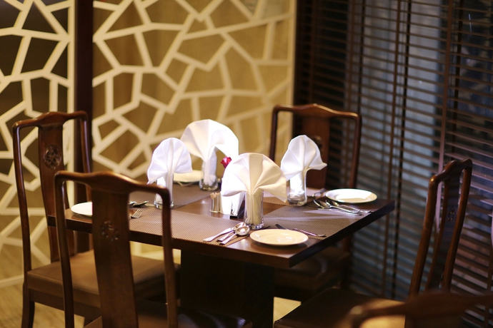Imagen del bar/restaurante del Hotel Five Elements Hotels North Avenue Delhi. Foto 5