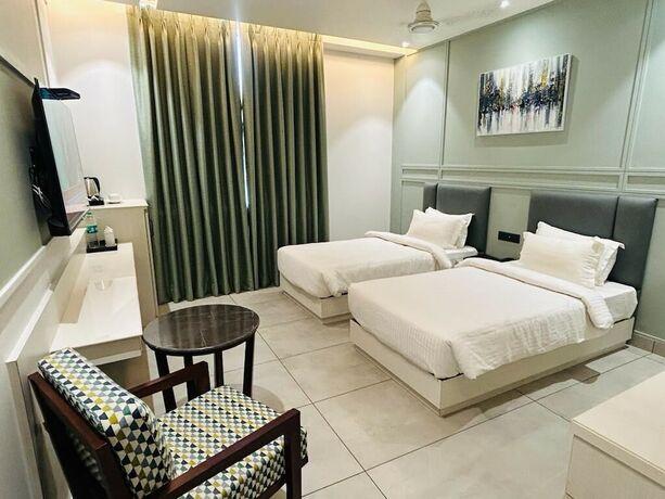 Imagen de la habitación del Hotel Five Elementss Goldleaf Haldwani. Foto 15
