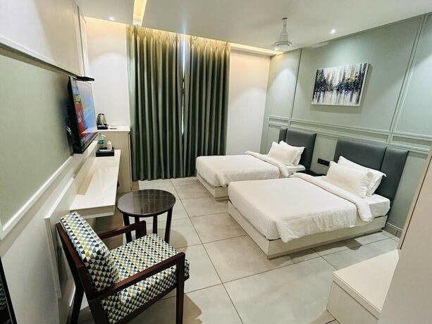 Imagen de la habitación del Hotel Five Elementss Goldleaf Haldwani. Foto 18