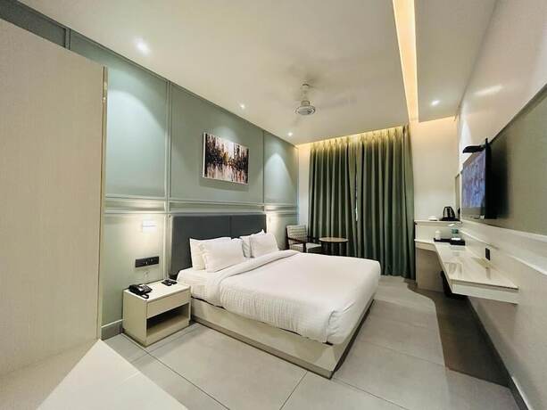 Imagen de la habitación del Hotel Five Elementss Goldleaf Haldwani. Foto 19