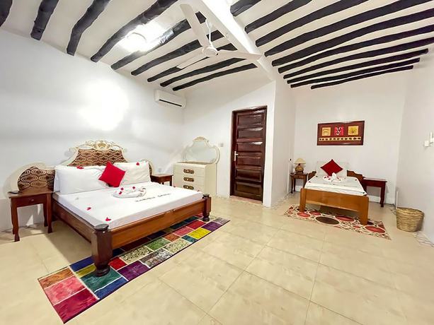 Imagen de la habitación del Hotel Five Palms Bwejuu. Foto 15