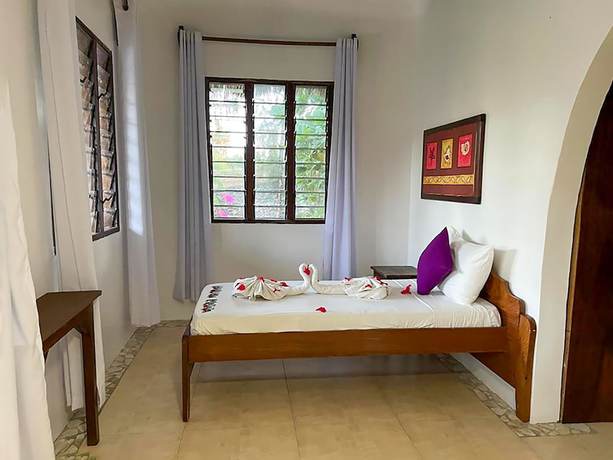 Imagen de la habitación del Hotel Five Palms Bwejuu. Foto 18