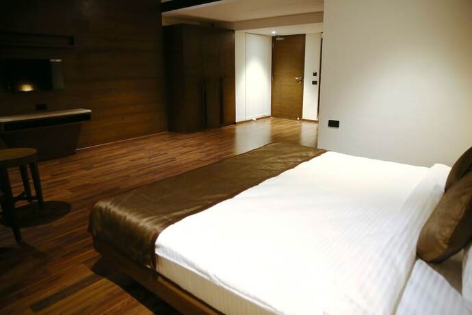 Imagen de la habitación del Hotel Five Petals and Banquets. Foto 17