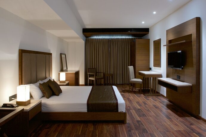 Imagen de la habitación del Hotel Five Petals and Banquets. Foto 21
