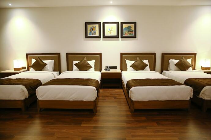 Imagen de la habitación del Hotel Five Petals and Banquets. Foto 22