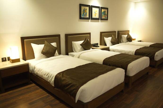 Imagen de la habitación del Hotel Five Petals and Banquets. Foto 23