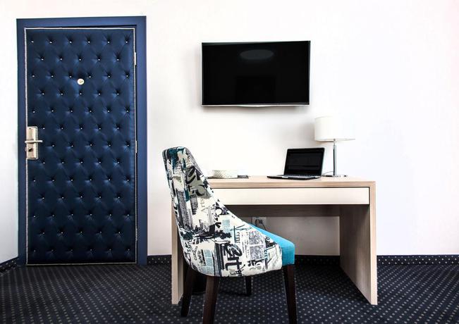 Imagen de la habitación del Hotel Five Points Square City Center. Foto 2