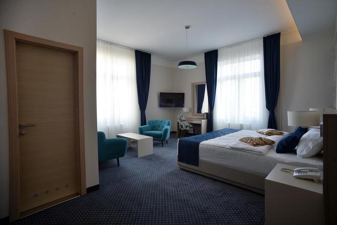 Imagen de la habitación del Hotel Five Points Square City Center. Foto 5