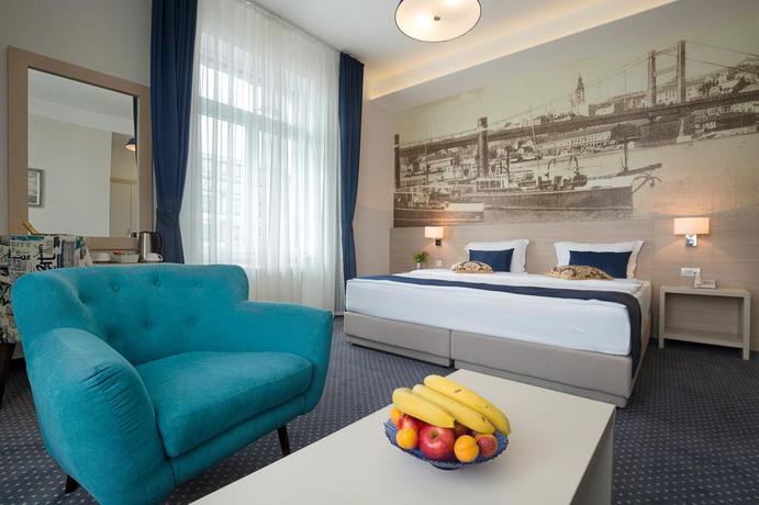 Imagen de la habitación del Hotel Five Points Square City Center. Foto 8