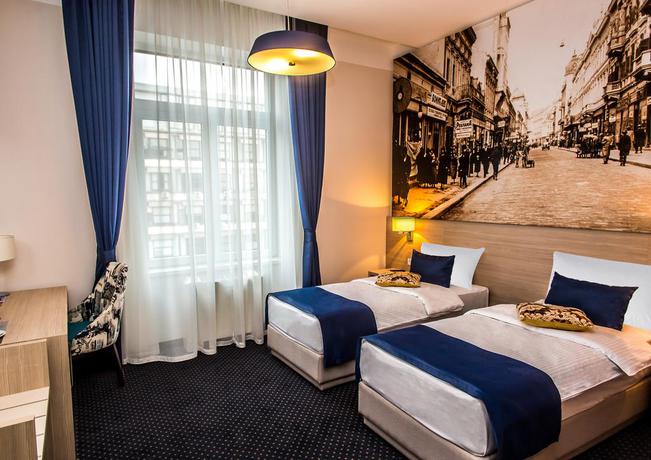 Imagen de la habitación del Hotel Five Points Square City Center. Foto 9