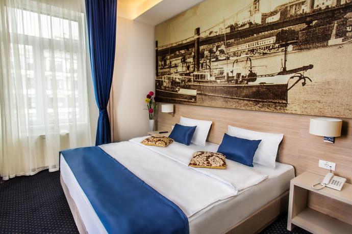 Imagen de la habitación del Hotel Five Points Square City Center. Foto 10