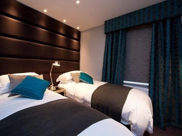Imagen de la habitación del Hotel Five Star Stays. Foto 19