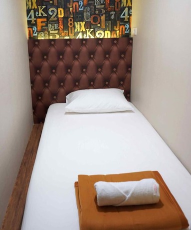 Imagen de la habitación del Hotel Fixon Capsule. Foto 11