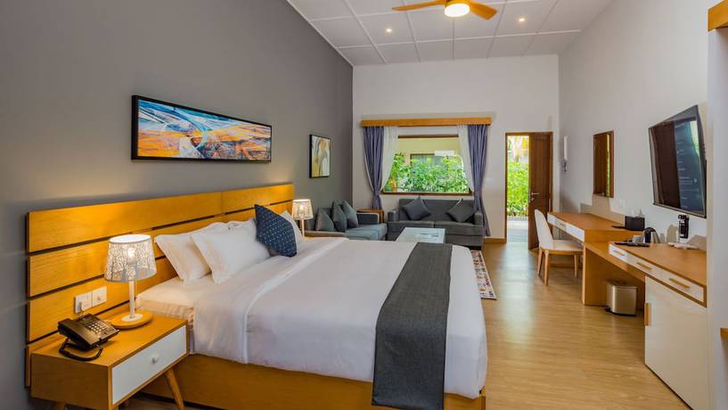 Imagen de la habitación del Hotel Fiyavalhu Resort Maldives. Foto 6
