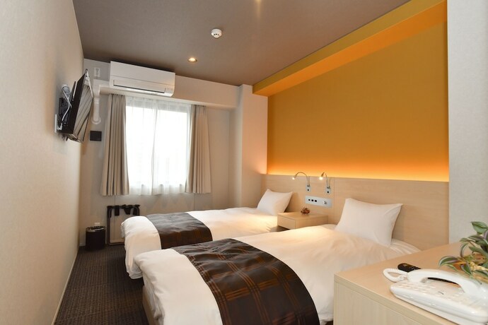 Imagen de la habitación del Hotel Fl Dotonbori. Foto 14