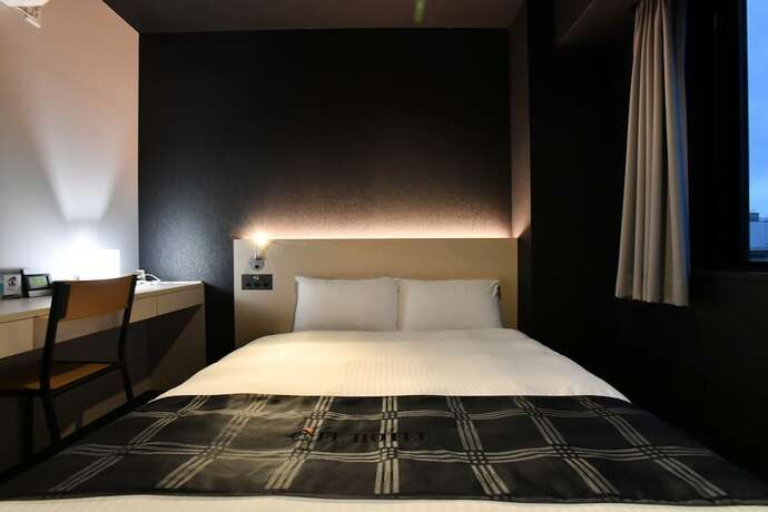 Imagen de la habitación del Hotel Fl Dotonbori. Foto 15