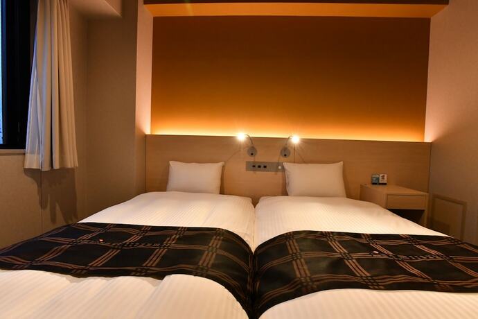 Imagen de la habitación del Hotel Fl Dotonbori. Foto 17
