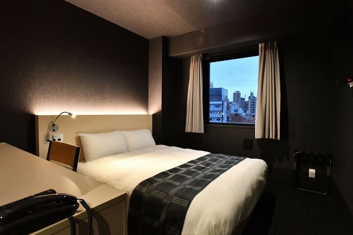 Imagen de la habitación del Hotel Fl Dotonbori. Foto 21