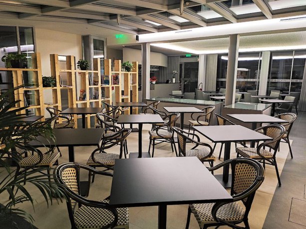 Imagen del bar/restaurante del Hotel Flag Design. Foto 2