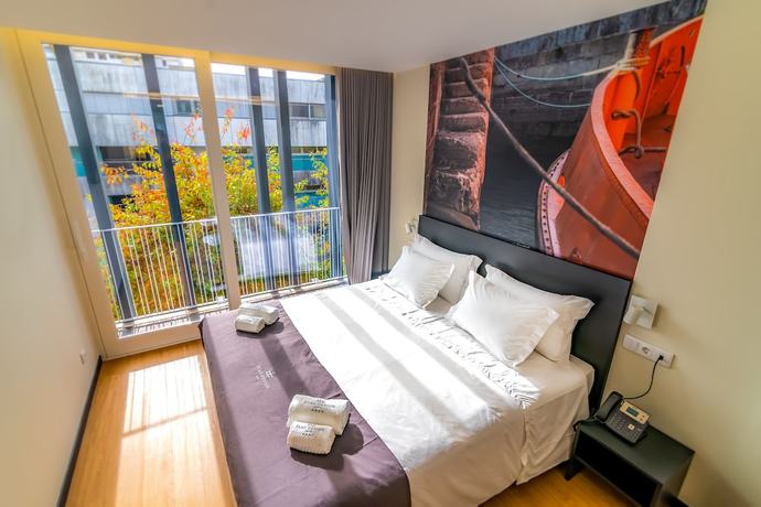 Imagen de la habitación del Hotel Flag Design. Foto 11