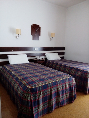 Imagen de la habitación del Hotel Flag Hotel F&aacute;tima Irm&atilde;s Dominicanas. Foto 3