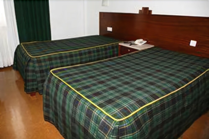 Imagen de la habitación del Hotel Flag Hotel F&aacute;tima Irm&atilde;s Dominicanas. Foto 7