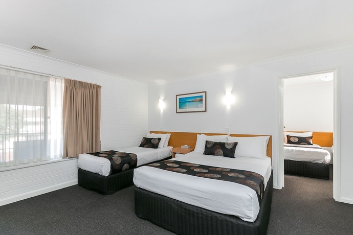 Imagen de la habitación del Hotel Flag Motor Lodge. Foto 6