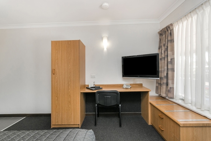 Imagen de la habitación del Hotel Flag Motor Lodge. Foto 10