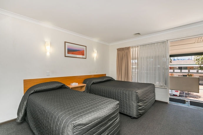 Imagen de la habitación del Hotel Flag Motor Lodge. Foto 13